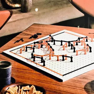 TwixT "Ingeneous New Strategy Game For Two" published 1962 by Avalon Hill