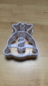 cookie cutter from money bag