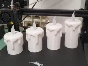 Melting candle tea light holder