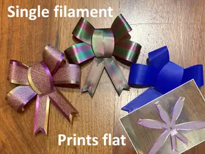 Folding gift bow