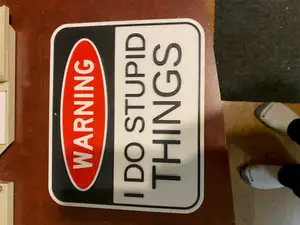 Warning stupid sign