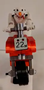 Snowman on an illusion of a motorcycle