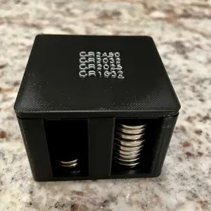 Container for coin cell batteries with optional embossed lid