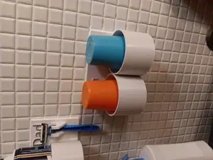 Wall mount cap holder, with drain hole. Mom & Dad.