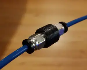 PC4-M10 PTFE Coupler