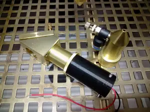 Collimator for reverse adjustment of laser mirrors