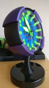 Mini clock for radio-controlled quartz analogue clock movement