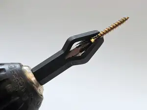 Auto-Releasing Screw Holder