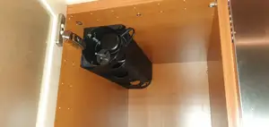 Holder for hand blender in a kitchen cabinet