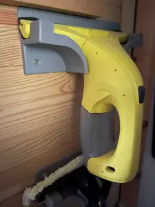 Wall bracket for Kärcher window vacuum cleaners.