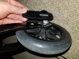 Wheelchair front wheel bolt protector cover