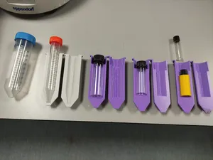 Centrifuge adapters from 50 mL to 15 mL Falcon tubes and various glass vials