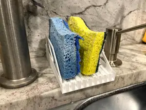 Vertical triple sponge holder for kitchen undermount sink