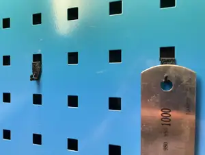 Hook for workshop cabinet - perforated panel