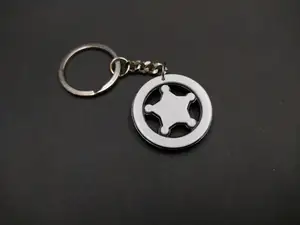 Rimworld logo keychain