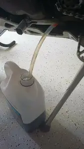 KTM adapter for draining the engine oil does not stain the motorcycle