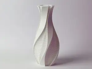 Twisted vase with strands