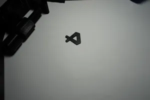 VS Code logo coin