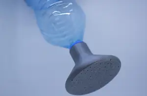 Watering can nozzle for bottle