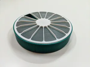 Circular pill box for 14 days with magnetic lid