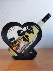 Heart shaped wine bottle holder.