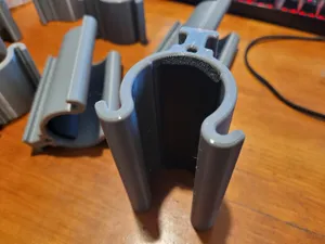 Greenhouse film/tarp clip retainer for pipe frame