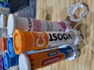 Vitamin effervescent tablet modular holder/stand. Very small print. Fits most brands.