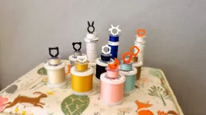 Spool & bobbin holder for convenient thread matched storage