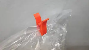 Minimalistic clothespin with 'snake-bite' grip