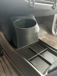 Rivian R1S and R1T Lower Console Trash bin fits into Yee Pin lower console organizer. Note: as of 3/25 the organizer is "not currently available on Amazon"