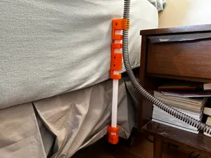 CPAP bed frame hose clip