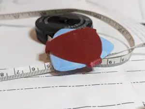 Triangular chalk holder