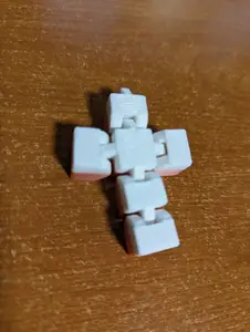Articulated cross keychain