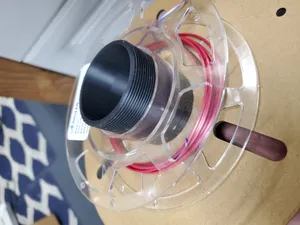 Small filament reel adapter to fit in a dryer box on wheels
