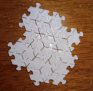 Interlocking rhombus tiles
