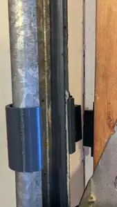 Clip for garage door tracks