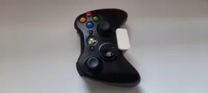 Universal wall-mounted gamepad holder