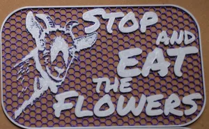 Stop and Eat the Flowers sign