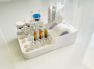 Medicine vial/ampoule holder