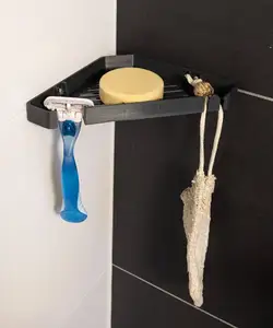 Shower corner shelf for soap and razor