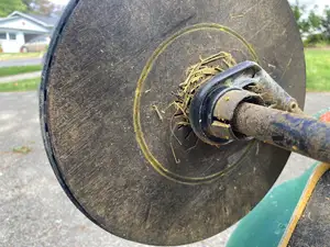 Wheel cap for Scott's fertilizer spreader