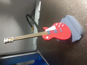 Gibson Les Paul guitar phone stand