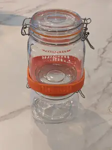 Stacking device for locking storage jars