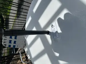 Lower umbrellas sign for pool or deck tables