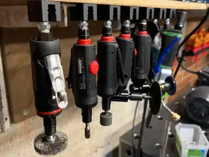 Pneumatic tool holder