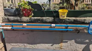 Holder for pool landing nets, hooks etc.