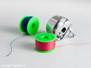 lower thread bobbin/spool generator for sewing machine (Unterfadenspule)