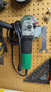Pegboard holder for Angle Grinder and key