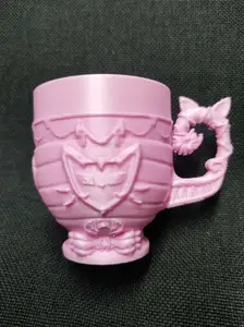 Regal Cat Crest Mug with Bow Base and Elegant Handle