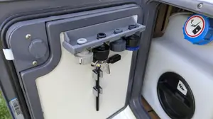 Holder for Gardena tap connector with lock